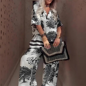 Weißes Zweiteiler-Set mit schwarzem Baummuster, Bluse und Hose, getragen | Fashion Peak